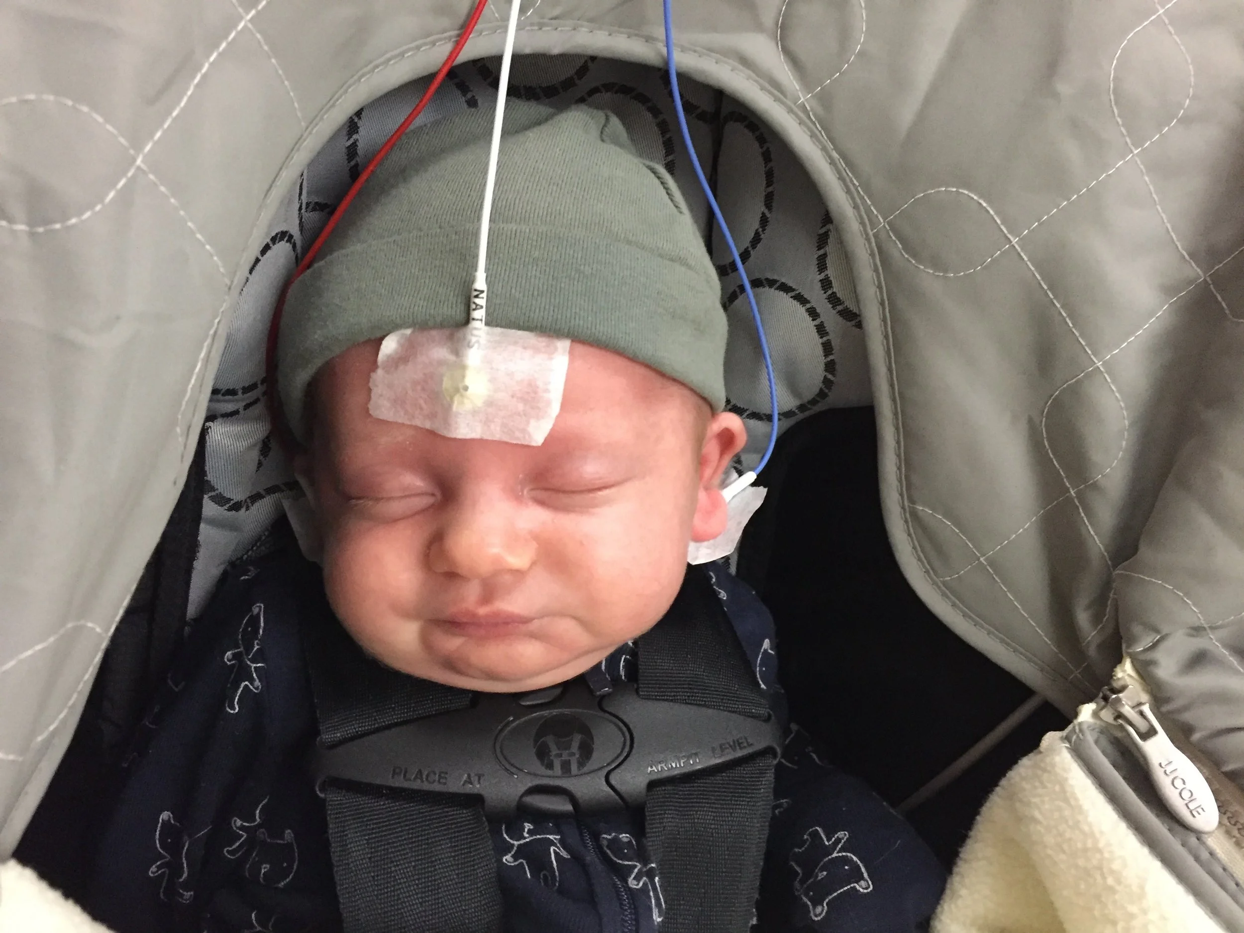 Here is my son at his first ABR test (Auditory Brainstem Response). The test uses a special computer to measure the way his hearing nerve responds to different sounds.