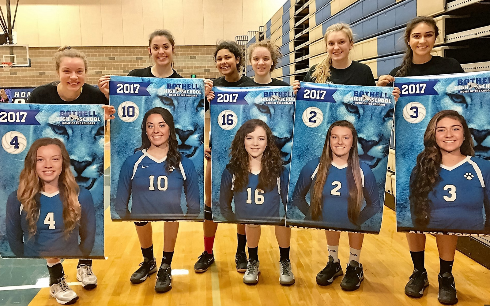 Sweet photo of the seniors with their banners. This is why I love my job!