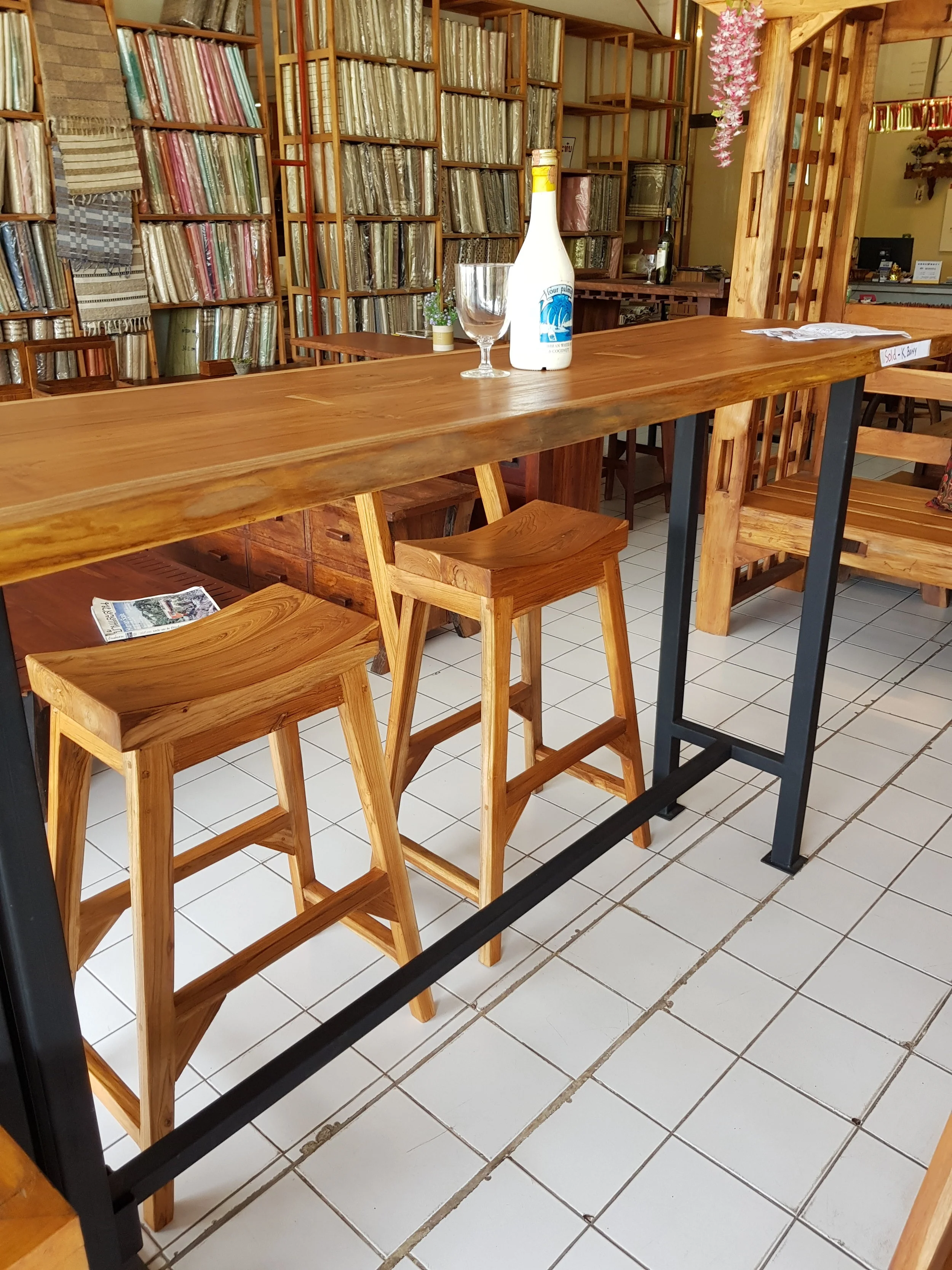 wooden and metal bar learner or breakfast bar $599.00  height 1.100 width .600 length 2.000  solid seat backless bar stool $250.  dimensions: height:750cm width: 500cm