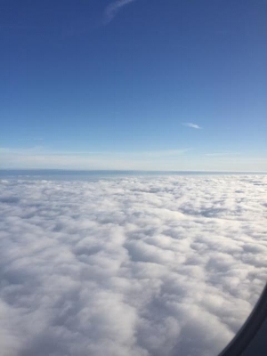 Clouds through a plane window.
