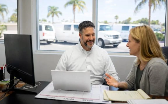 HVAC staff with client