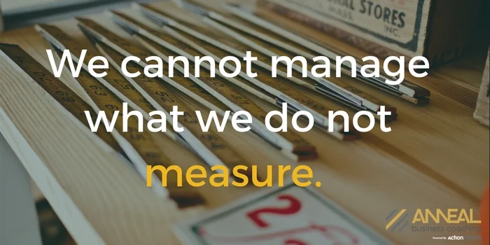 Anneal Business Coaching, Martin Holland article graphic over a drawer of wooden rulers, with the quote often attributed to Edwards Deming: "We cannot manage what we do not measure.
