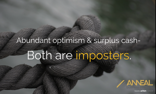 Martin Holland, Anneal Business Coaching, quote graphic: “Abundant optimism & surplus cash. Both are imposters.