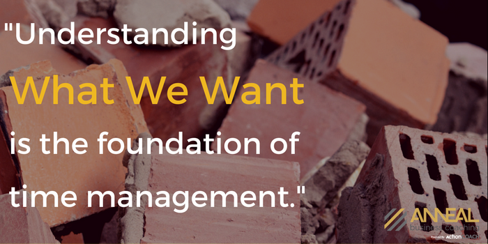 Anneal Business Coaching graphic from Martin Holland reading "Understanding What We Want is the foundation of time management," over a pile of broken bricks.