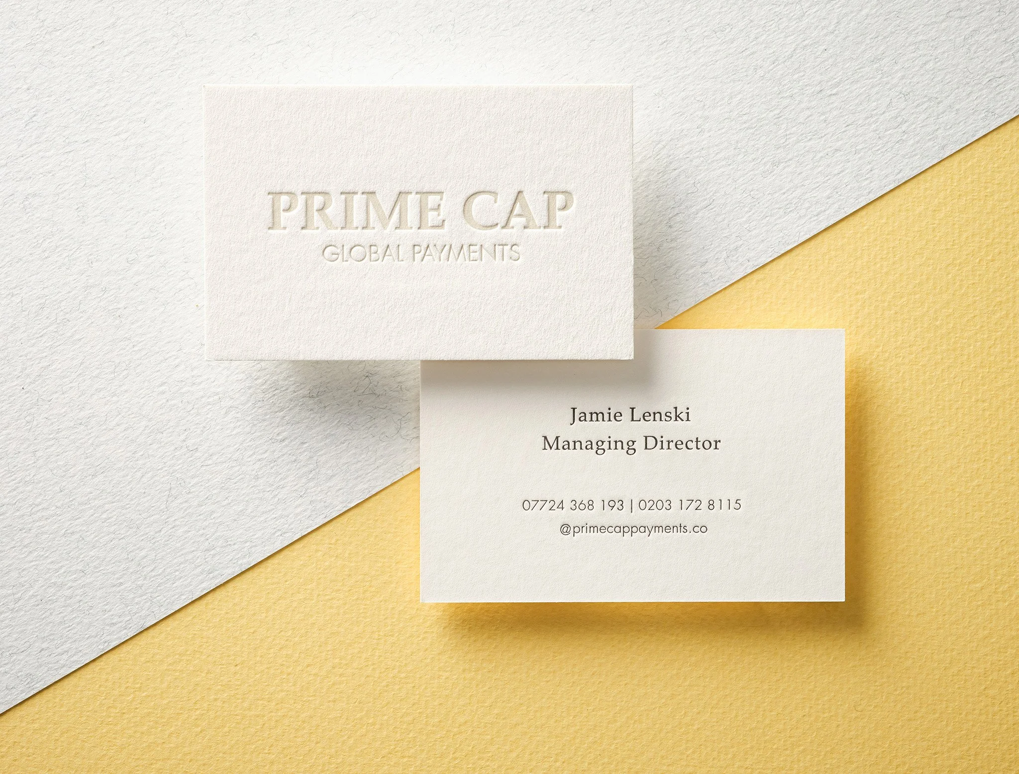 Shadow deboss business card on white stock with letterpress printed reverse