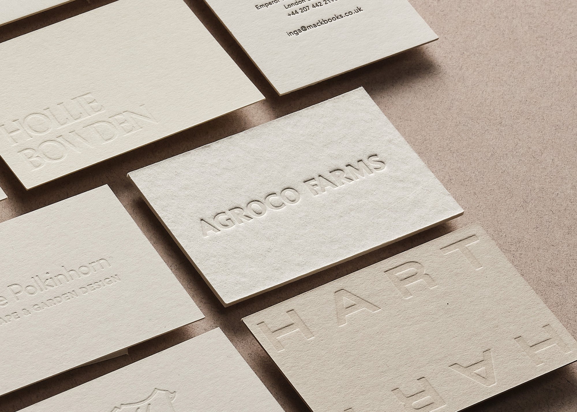 Deep pressure letterpress debossed business card on cotton stock