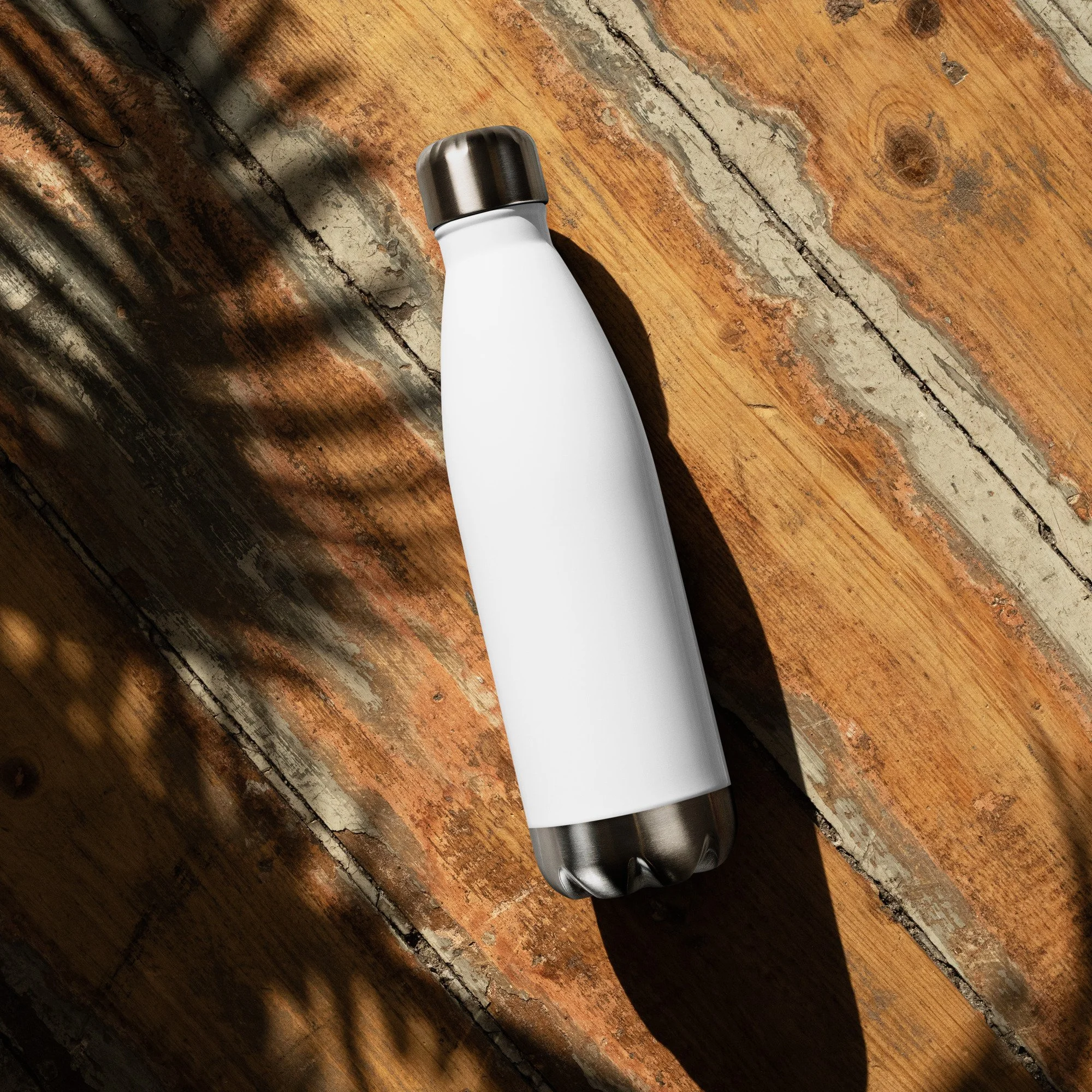 stainless-steel-water-bottle-white-17-oz-back-67e6b1e65daa5.jpg