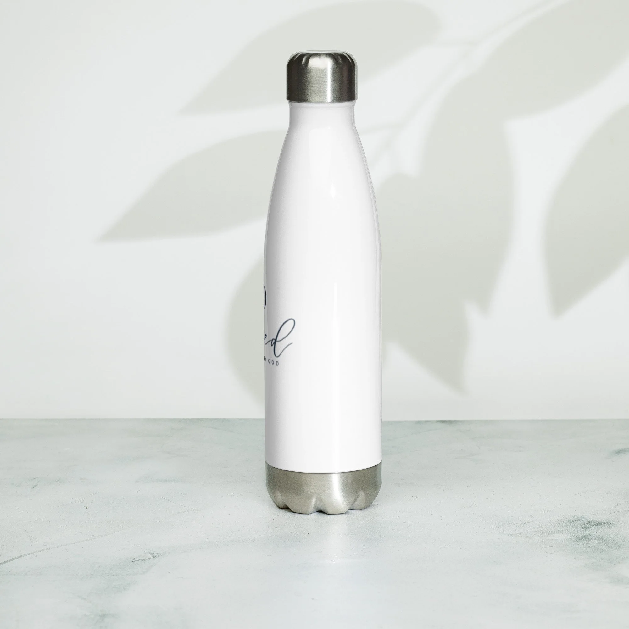 stainless-steel-water-bottle-white-17-oz-left-67e6b1e65df32.jpg