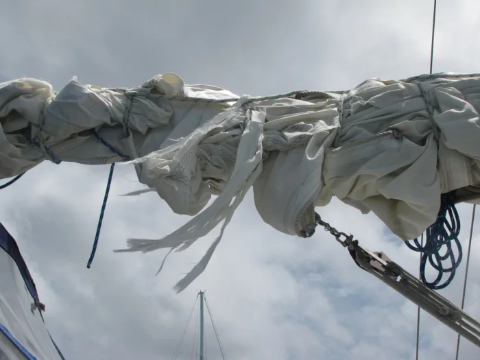 The tattered mainsail