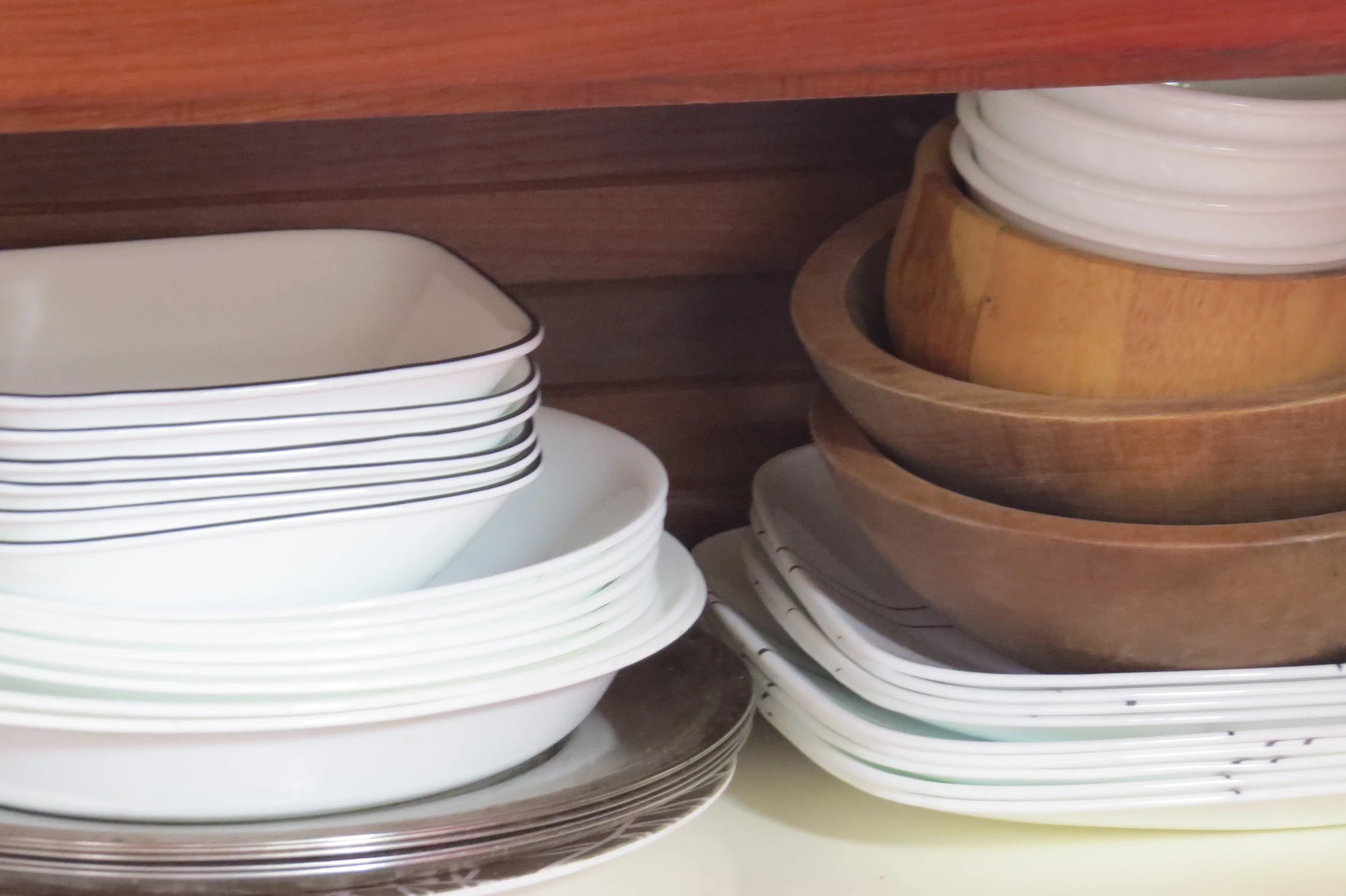 Stacking may not be as convenient, but it saves lots of space. Go vertical ... not horizontal.