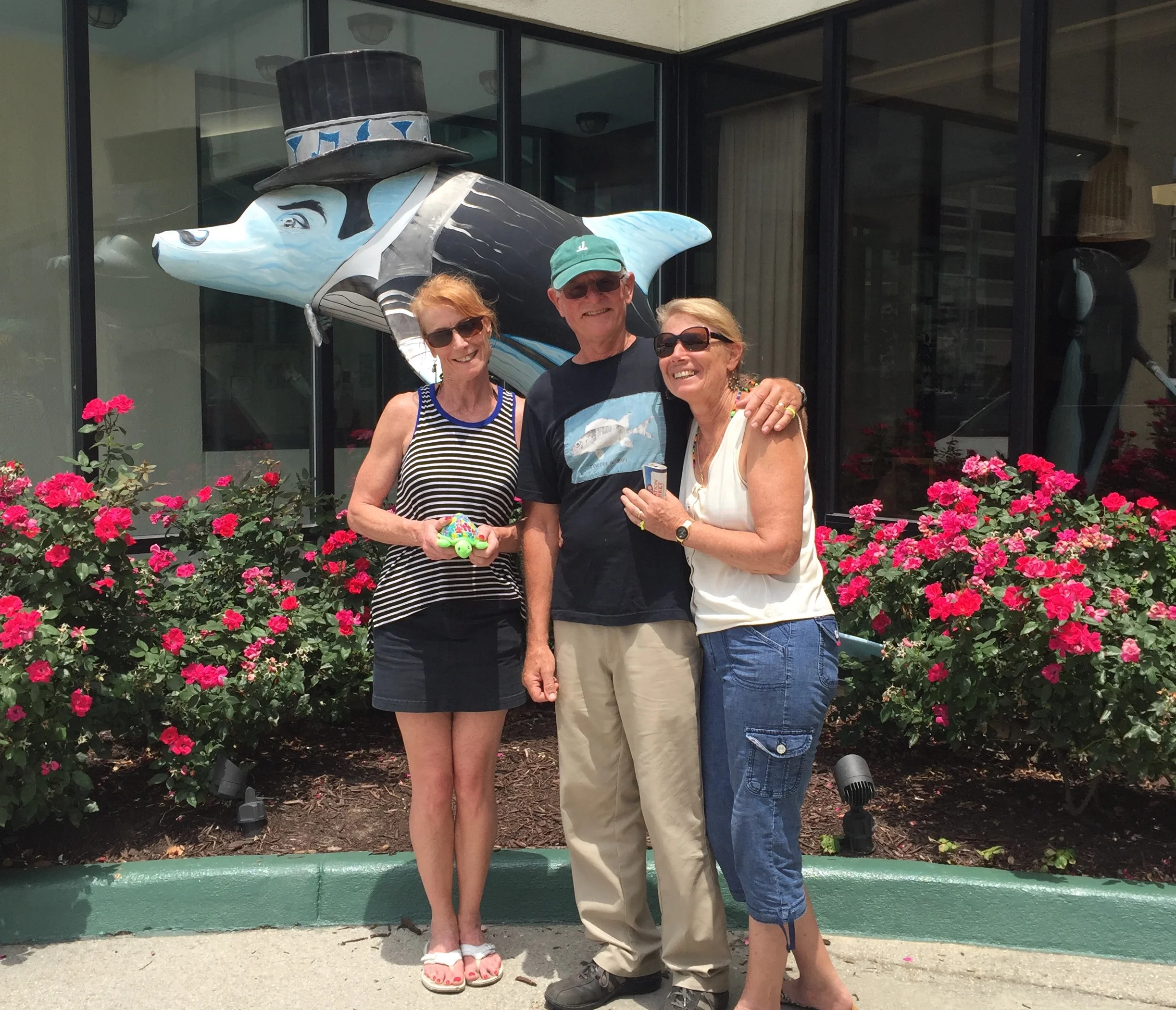 The dolphin officiated; Lin was matron of honor and a plush turtle was best man. 