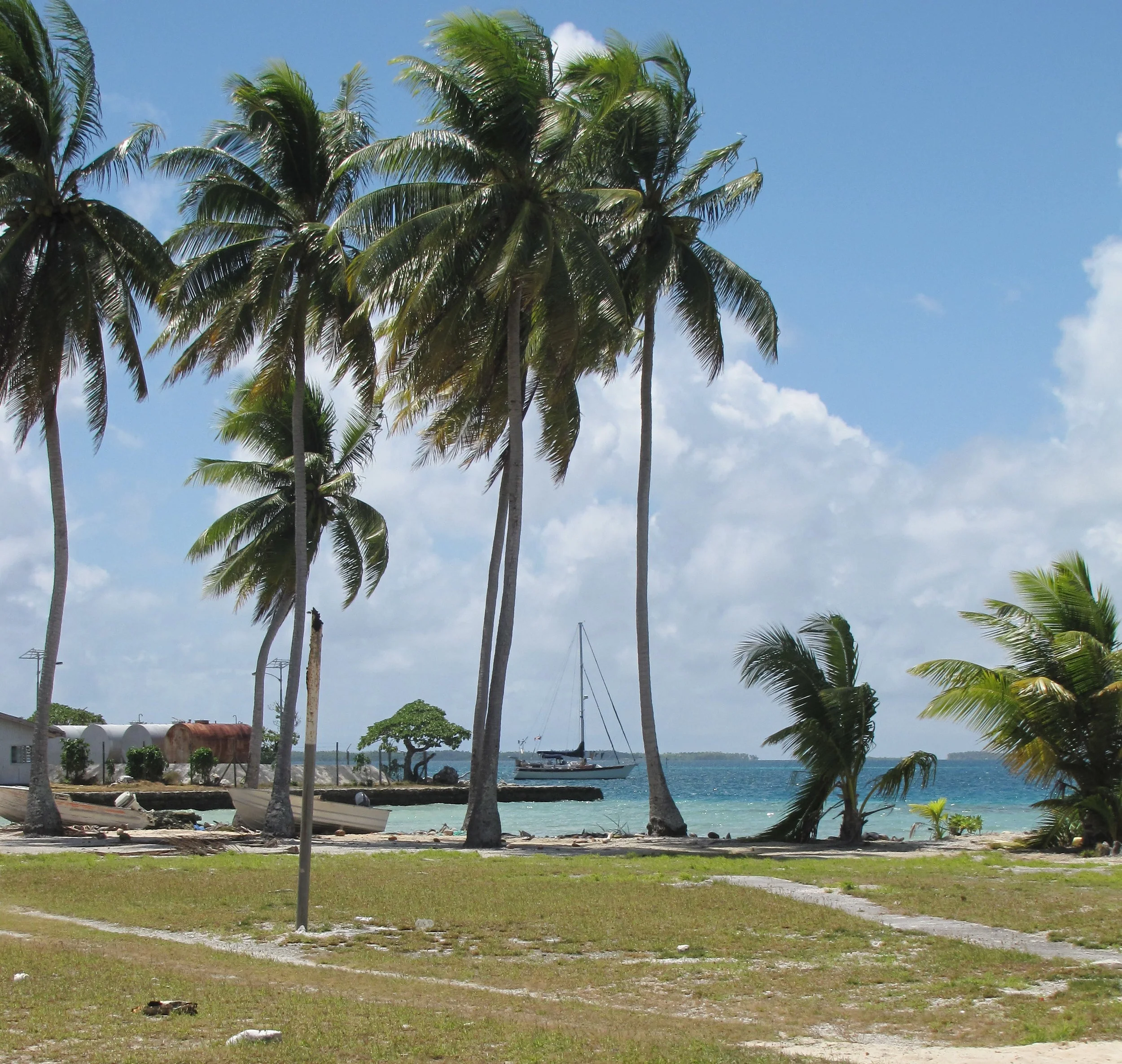 Nine of Cups anchored off the tiny village of Omoka at Penrhyn atoll, cook islands