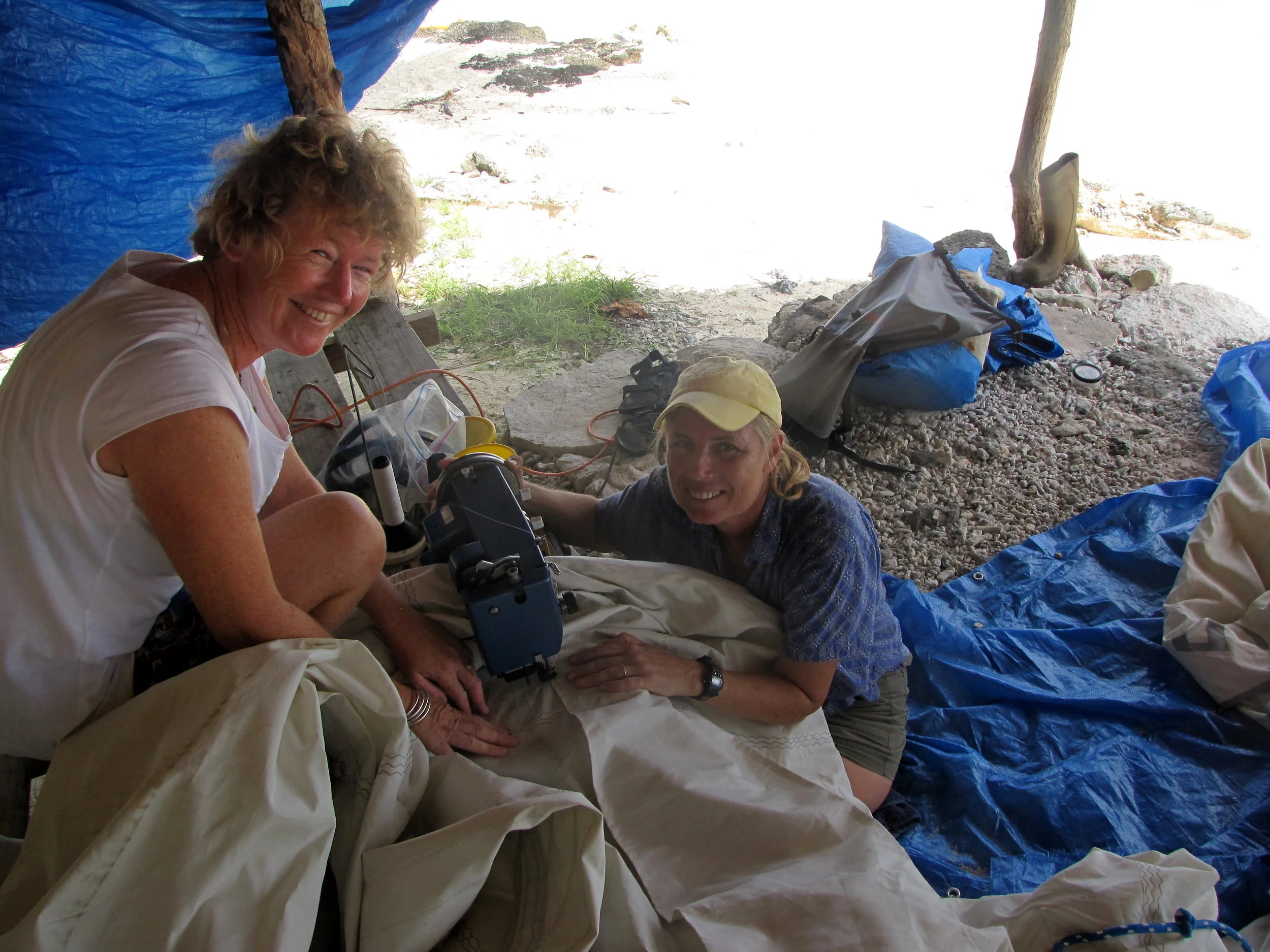 With the help of David and my kiwi friend, Clare on manaroa, we managed to patch and stitch the 12' long tear in the mainsail. 