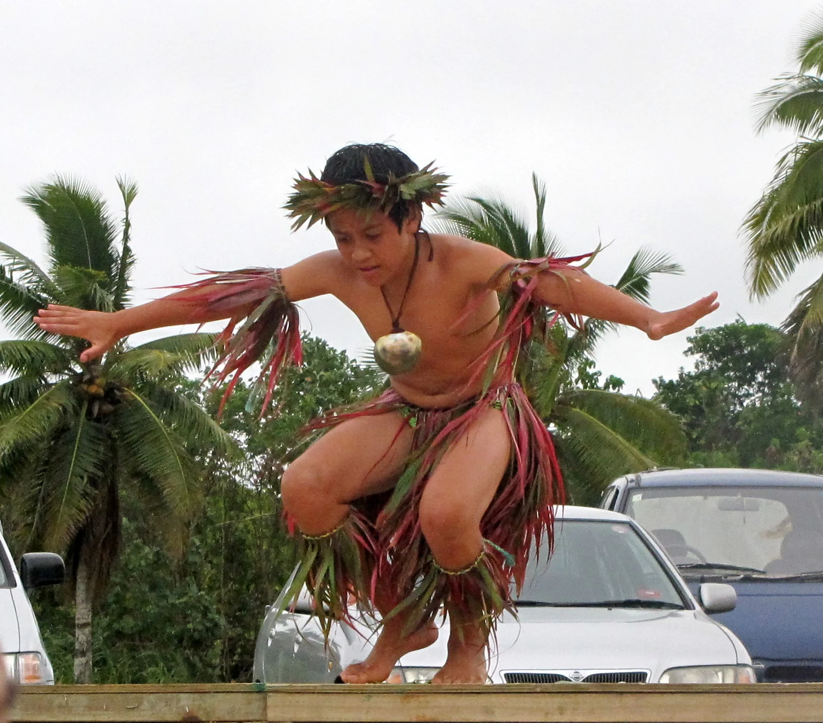 Traditional dancing on Village Day, a festive market that changes venues regularly.