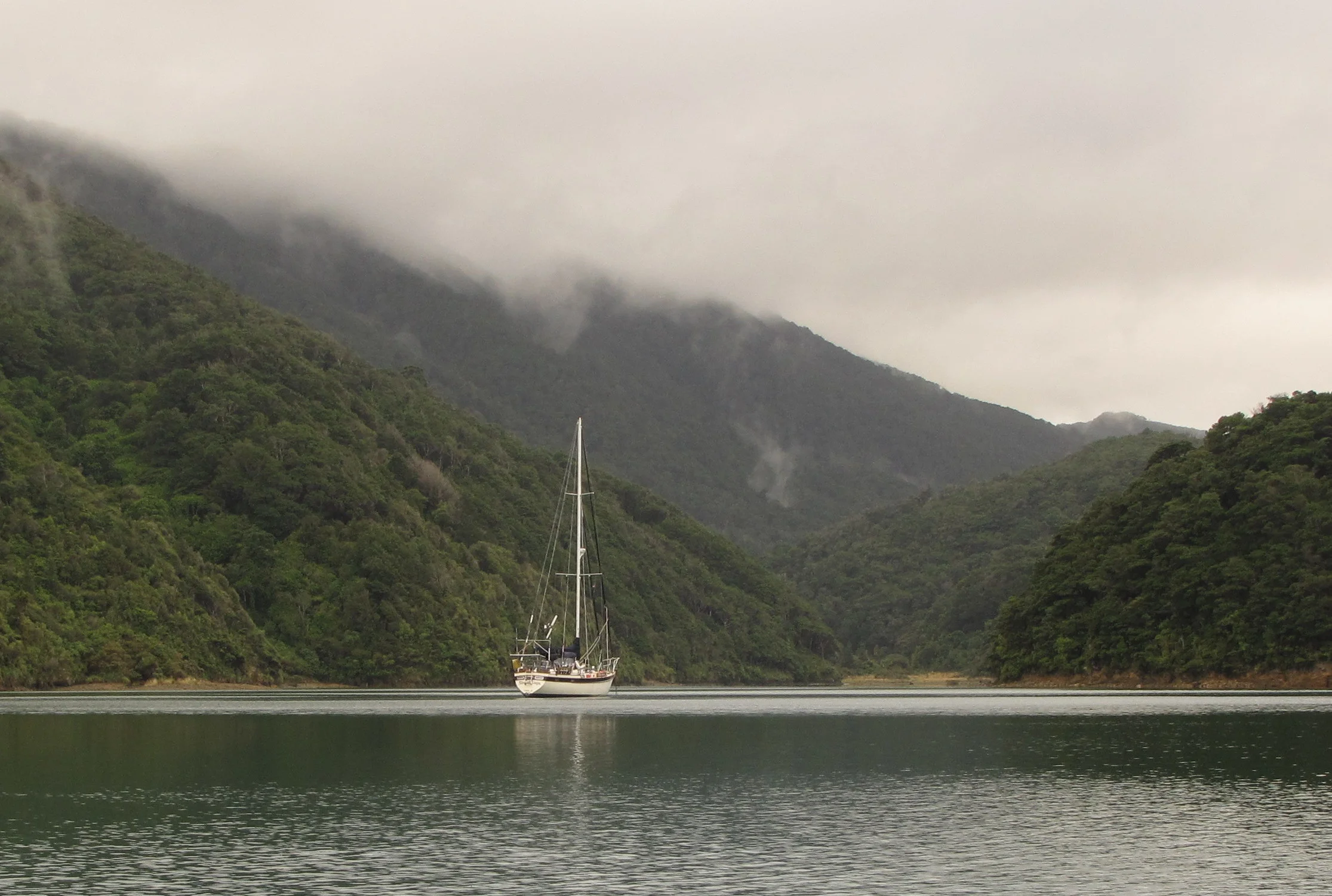 Early morning mist in an isolated, protected anchorage off D'Urville Island in the Marlborough Sounds.