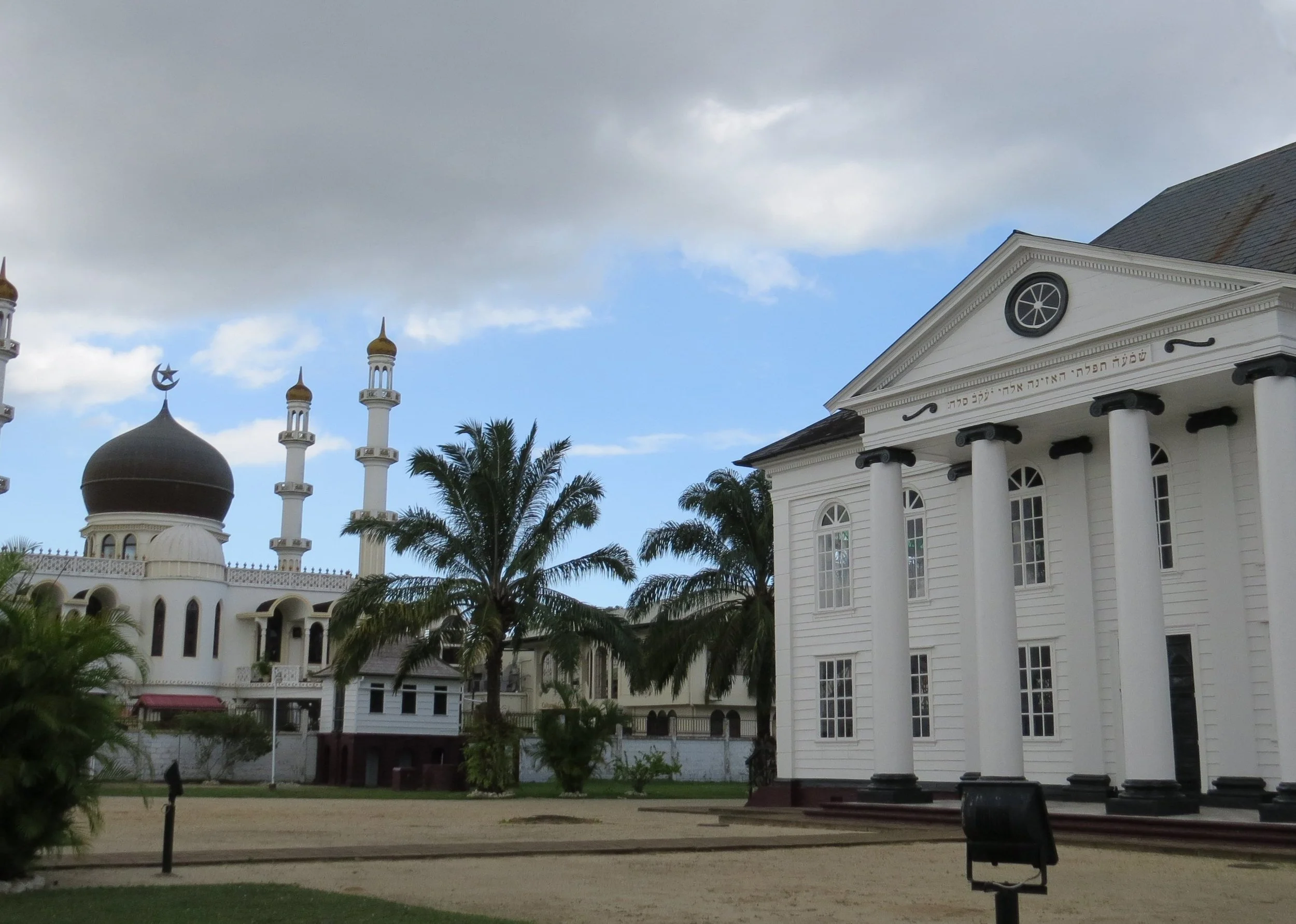 Mosque and Synagogue side by side ... they even share a parking lot.