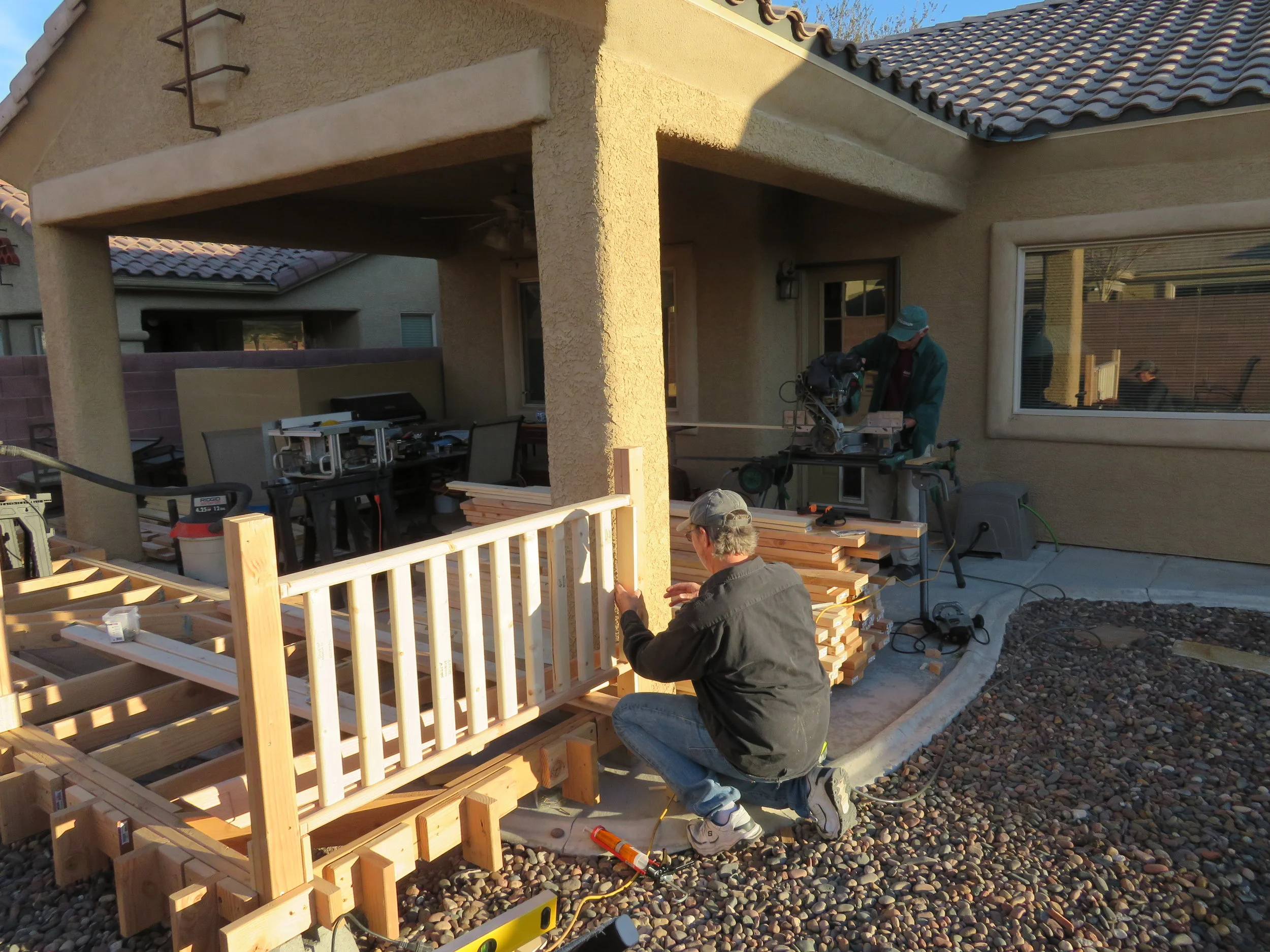 The Lynn Bros building the backyard deck.