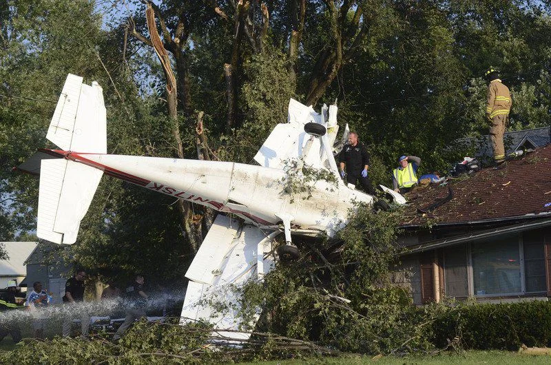 insurance_plane crash in roof.jpg