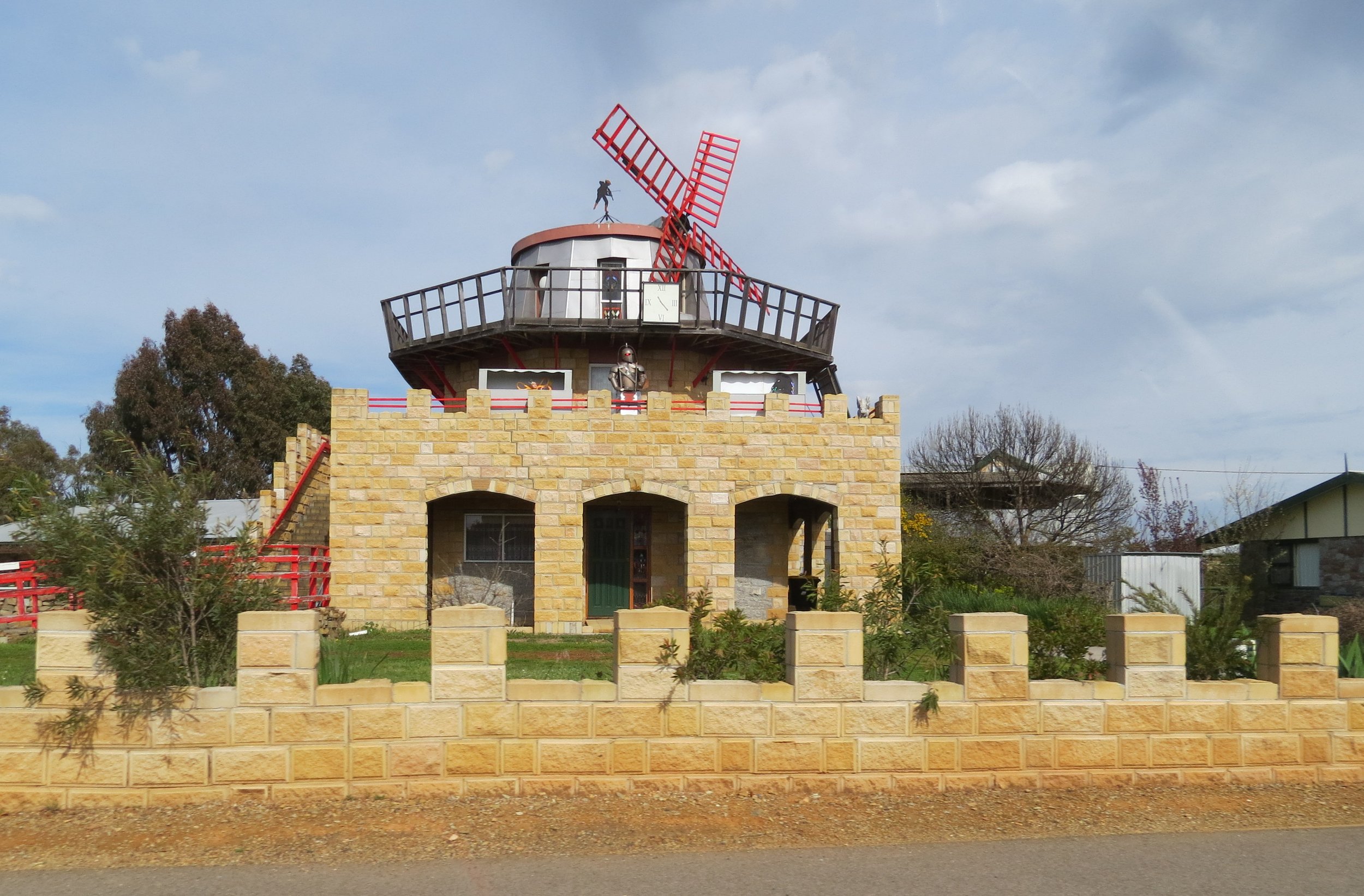 Windmill house with red-eyed knight