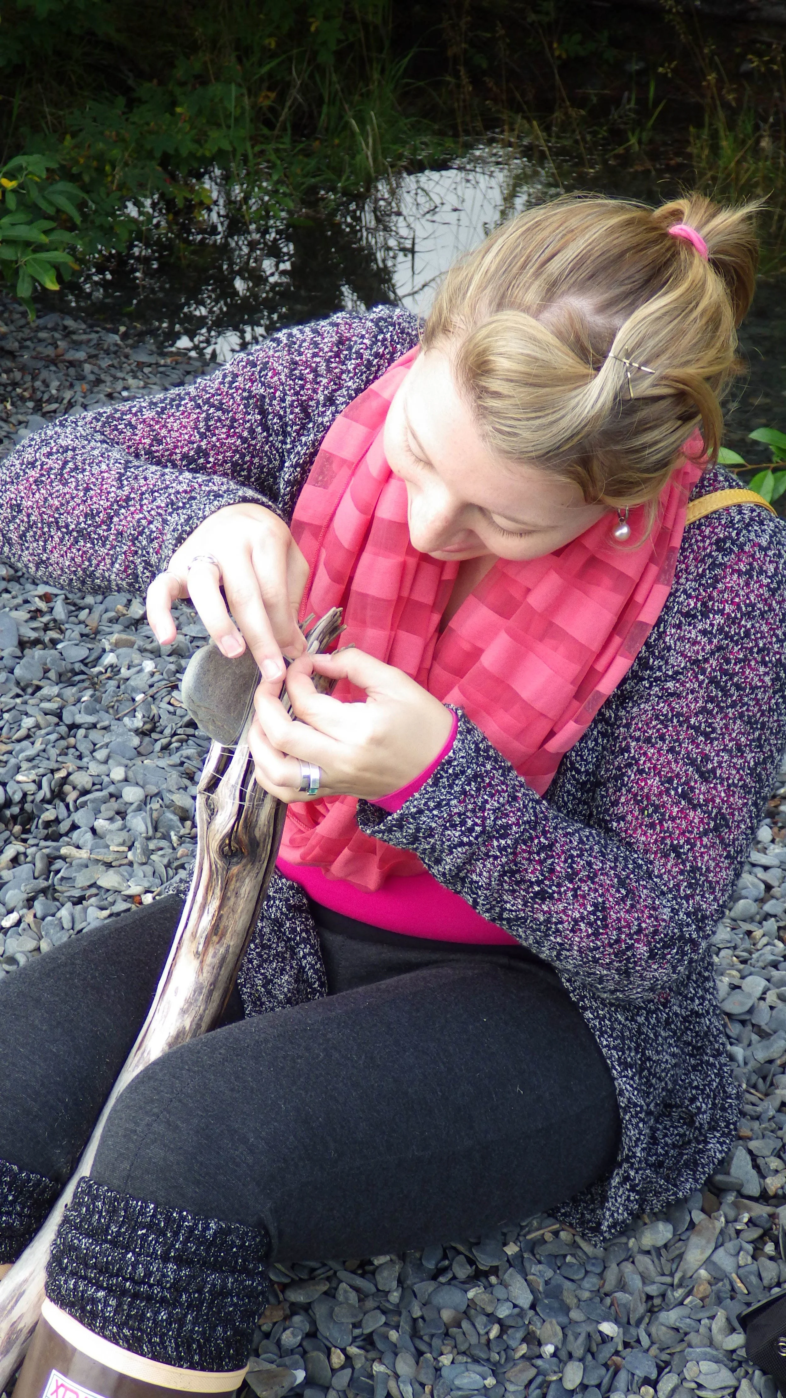  Melanie making a spear/club/thing. 