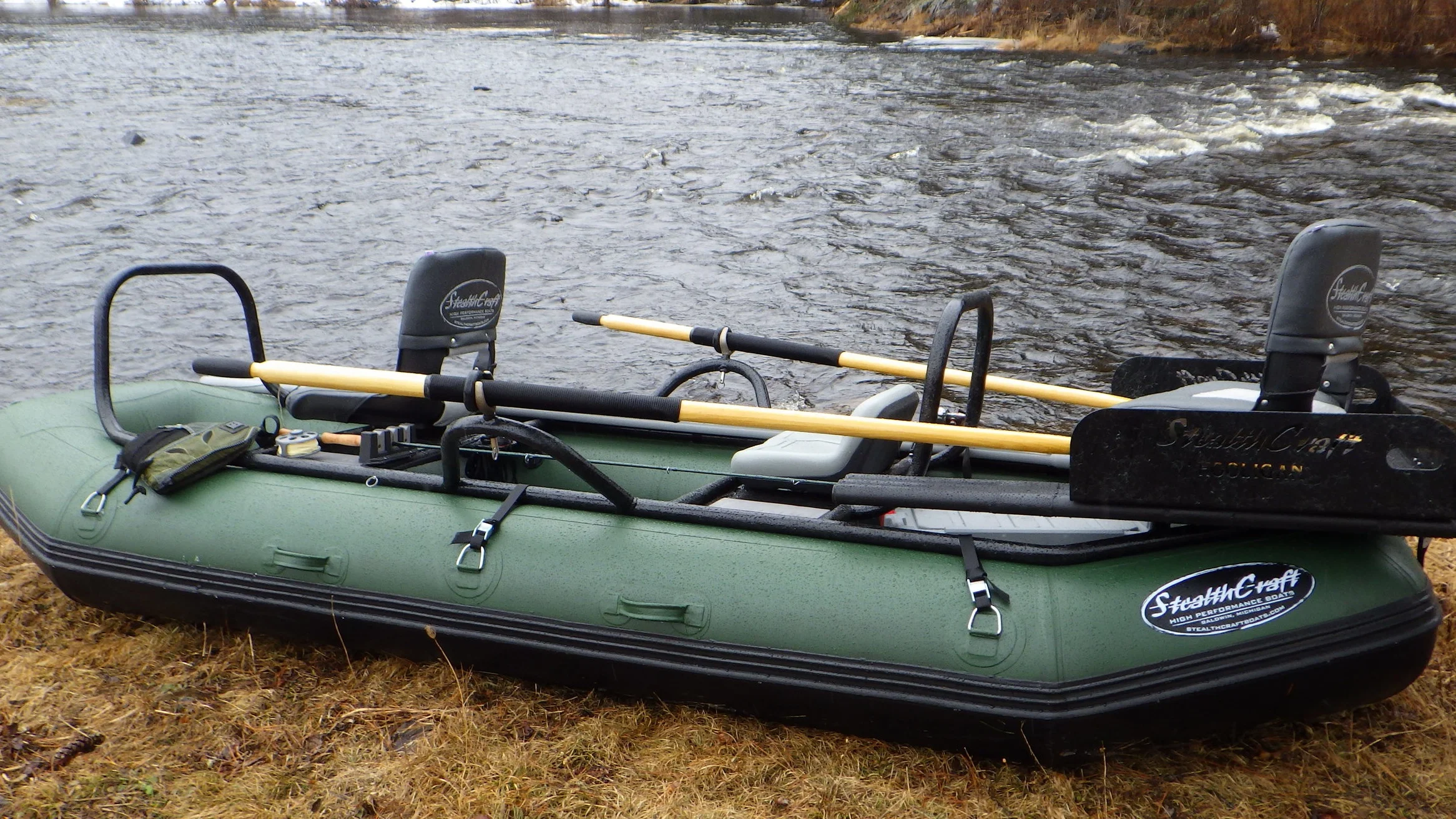  Getting the raft ready - now the temps just need to rise a bit.  Yes, that’s snow in the background. 