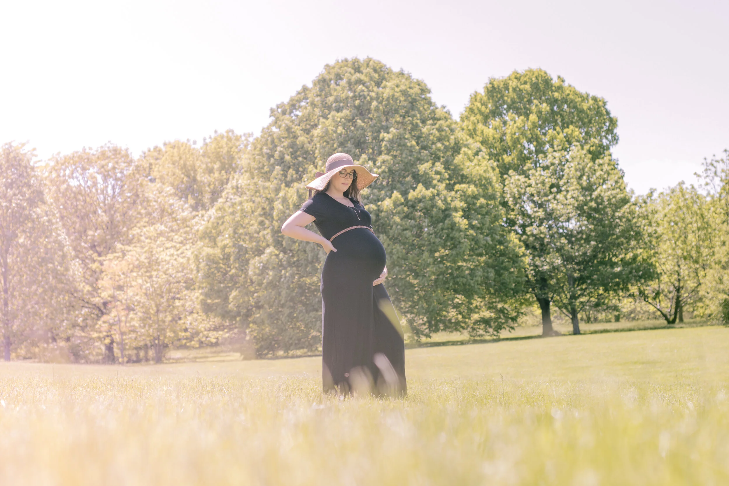 Beverly (in active labor!) during a recent Maternity Shoot with Cozyshoppe.