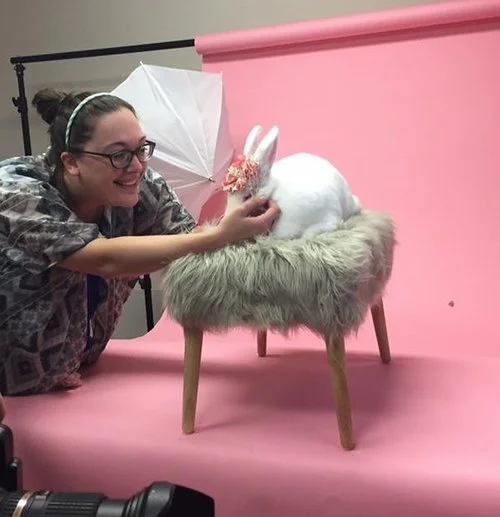 Corijona helps Eloise get in the right pose for her close up.
