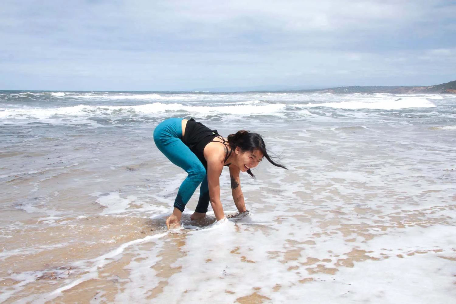 Bakasana, thwarted by rogue wave! Photography | Andrew Lawes