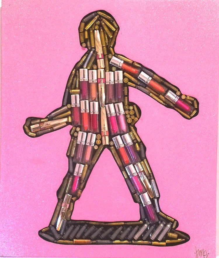    SOFTER     SIDE OF WAR     24 by 20, bullet shells, Lipstick, enamel, wood.&nbsp; 2017     