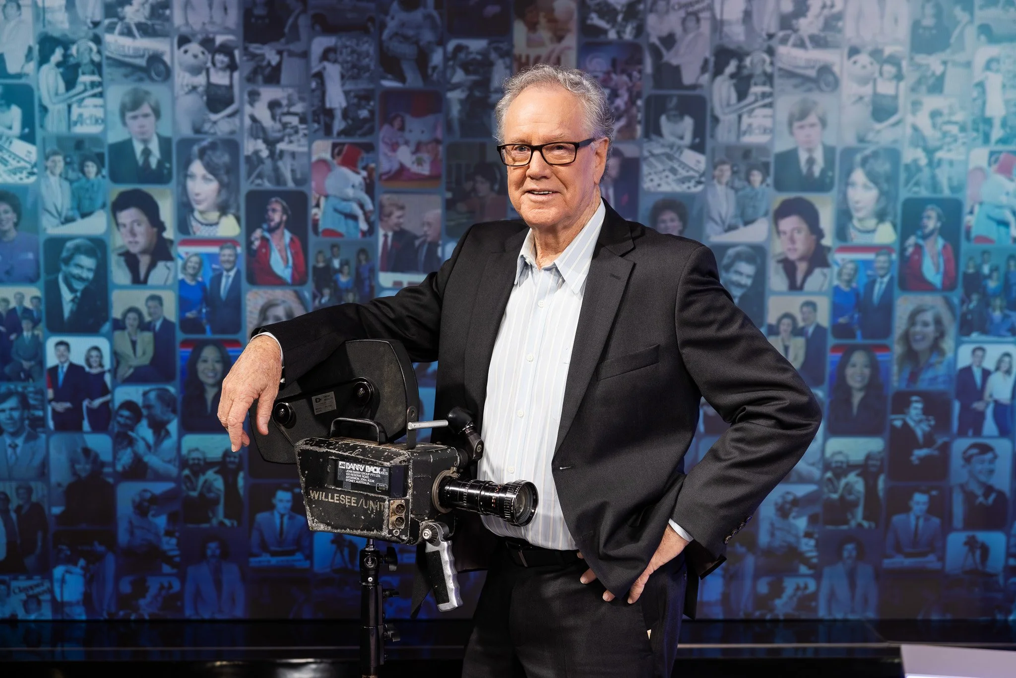 Terry Willesee next to the historic Willesee Unit camera, an original 1960s studio camera from Channel 9 Perth — photographed by Ryan Ammon | Ammon Creative.