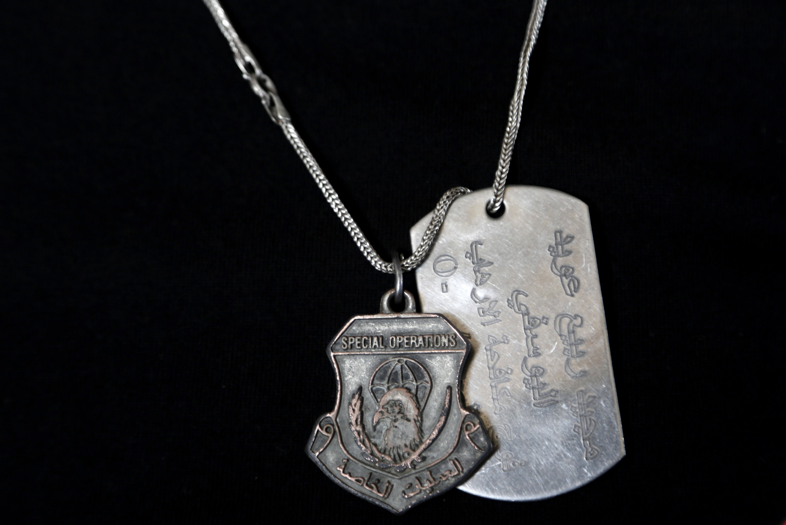 Sgt. Majid Rahim wears a dog tag and a special forces pendant. 