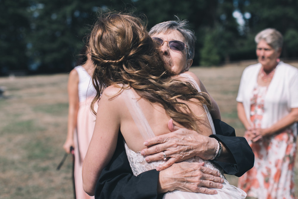 bride hugging grandma at kitsap memorial state park
