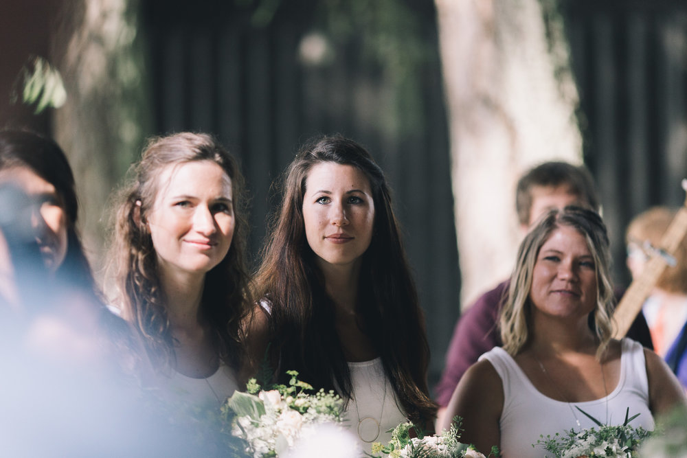 kitsap memorial state park  bridesmaids look at bride