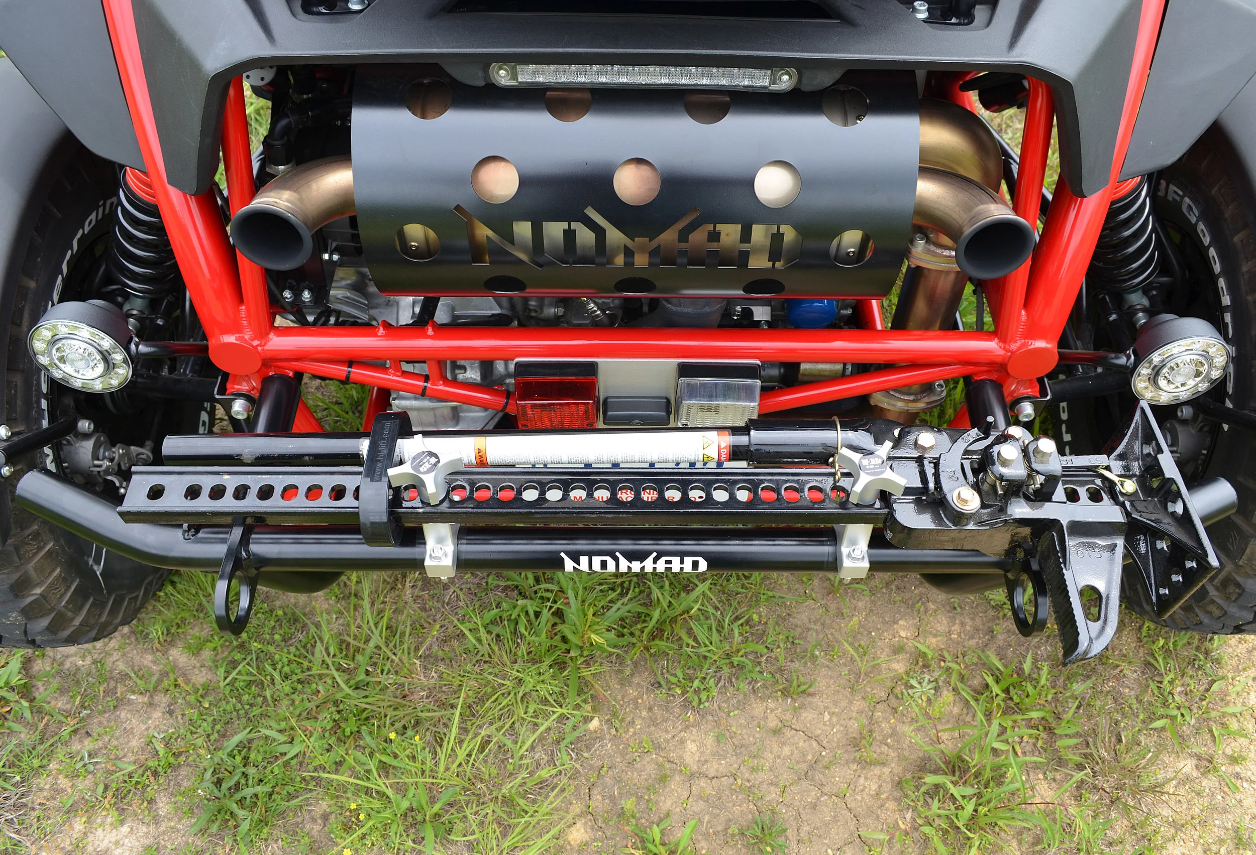 1: Ensure you're in a safe location and locate jack on rear bumper of an equipped Ariel Nomad: