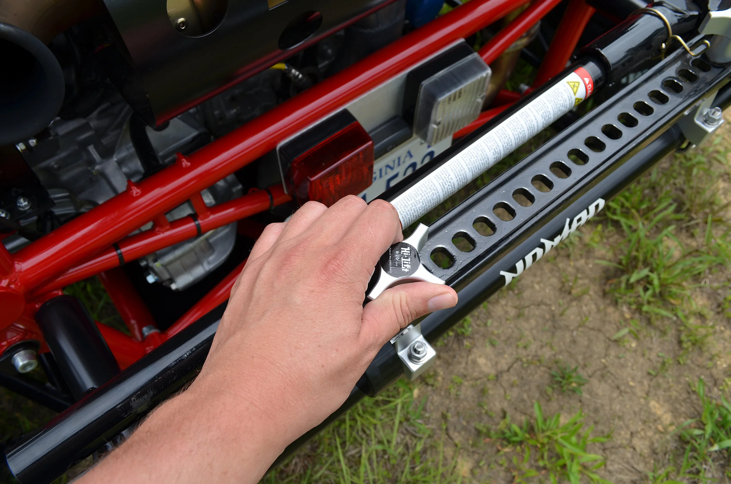 3: Remove hold downs and remove jack.