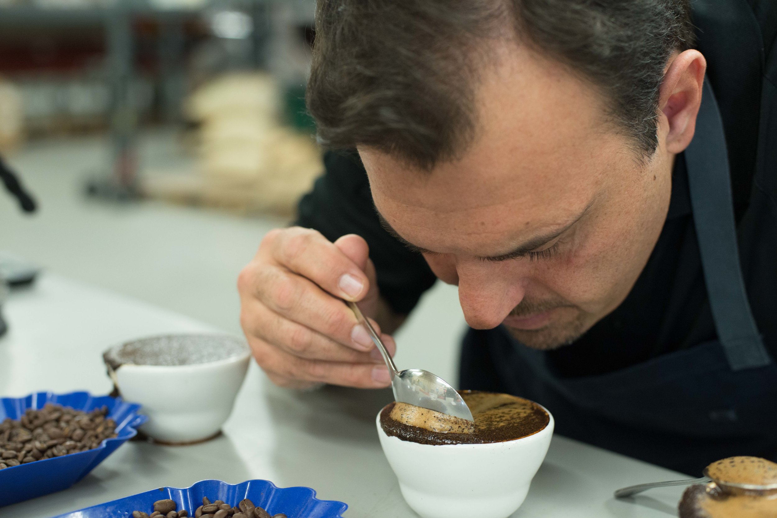 Cupping each batch of coffee and espresso.