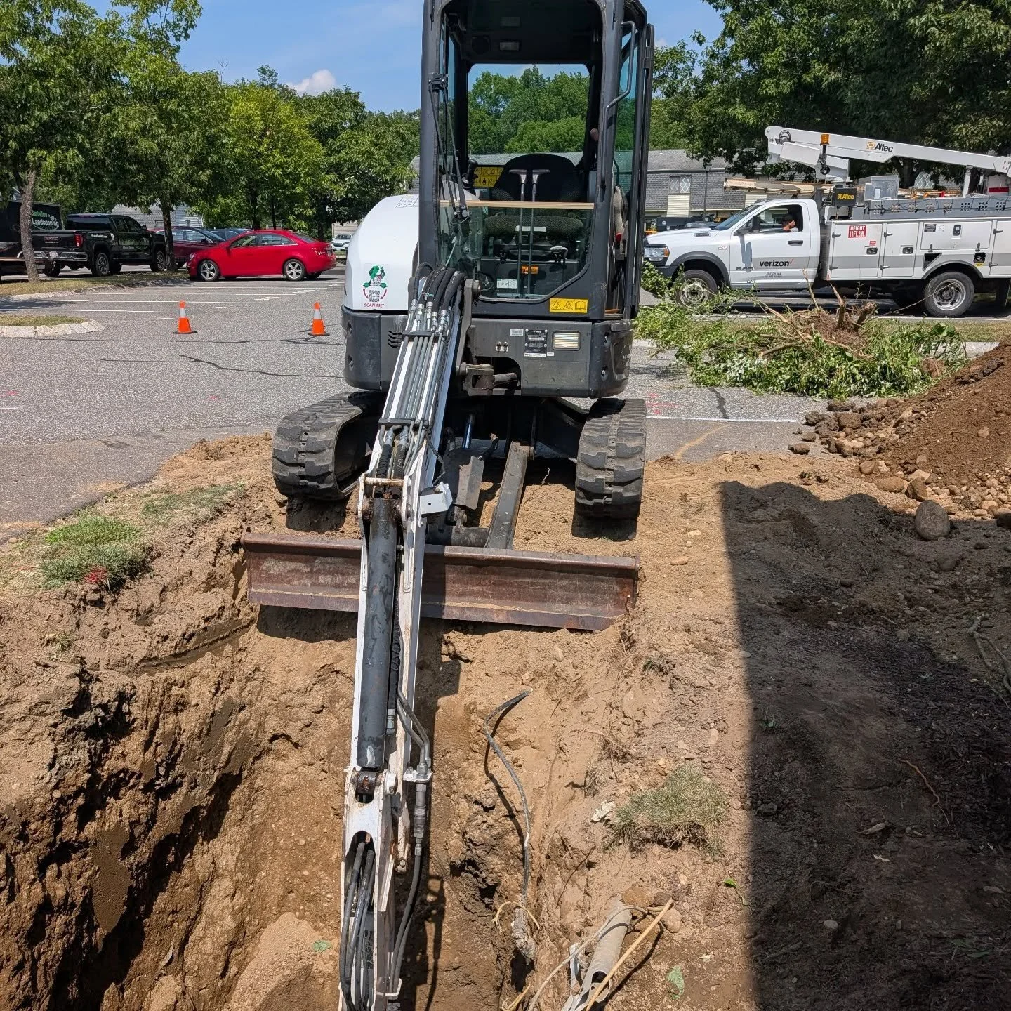 Received a call for an emergency excavation for water repair. The crew responded and was on site within an hour and a half. The water shut off was 10' down. Abandoned electrical and telephone line were discovered but we're not live.  Water was back u