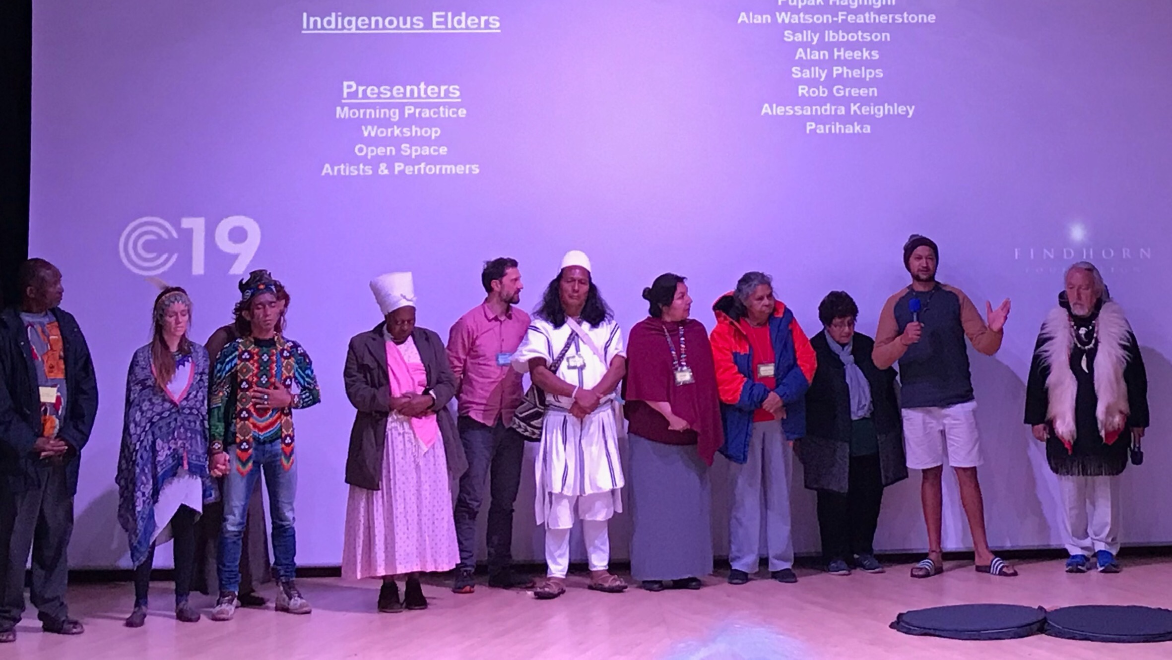 Indigenous elders at the conference. The Qilaut wind drums are in front of Angangaaq on the right.