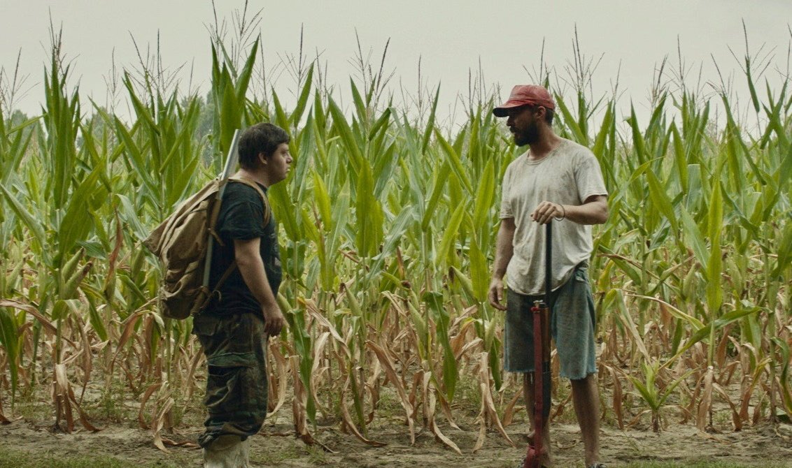 Zack-Gottsagen-and-Shia-LaBeouf-in-THE-PEANUT-BUTTER-FALCON-Photo-Credit-Nigel-Bluck-Courtesy-of-Roadside-Attractions-and-Armory-Films-1132x670.jpeg
