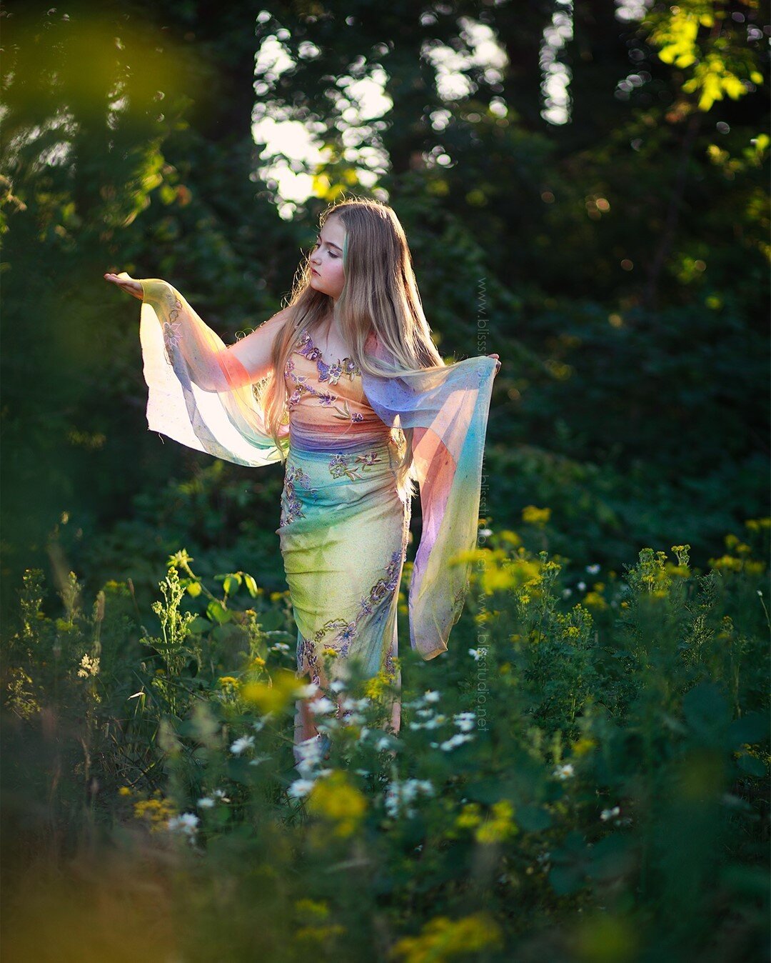 My beautiful little fairy! We have hit the stage in life where every photo session is a negotiation. I wanted to play in my yellow field last night a bit and she only agreed if she could wear her Aunt's old prom dress. So we made it fit/work for the 