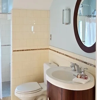1c_SinktoShower_YellowTileBath_SM.jpg