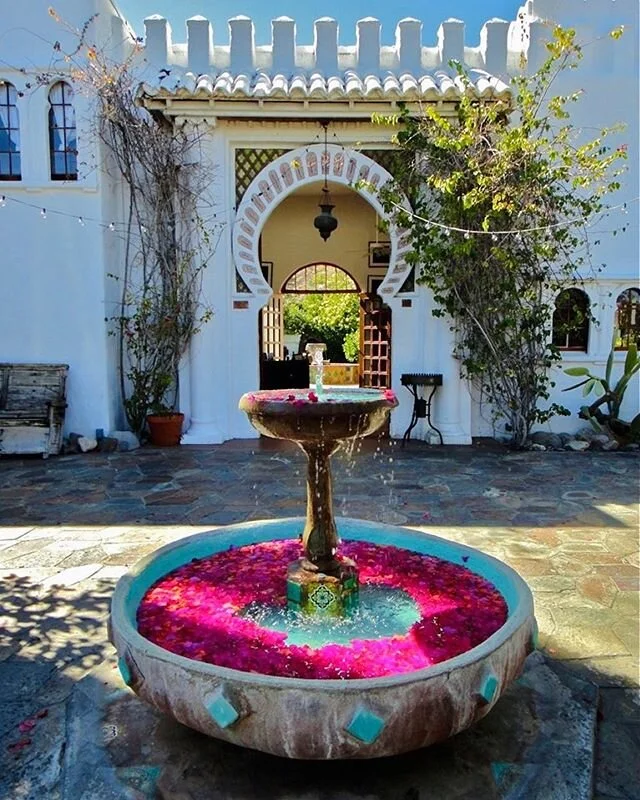 HVD original photo / I can&rsquo;t say time&rsquo;s flying these days &mdash; but I also can&rsquo;t believe it&rsquo;s been 8 years since I spent a few days at Korakia Pensione

here, the property&rsquo;s entrance courtyard beckons guests to a 1924 