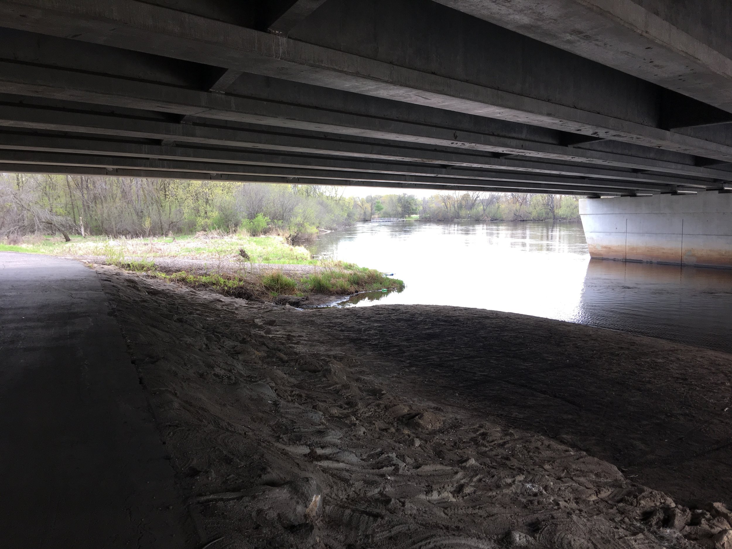 View from under the Bunker Lake Boulevard bridge down the Rum River
