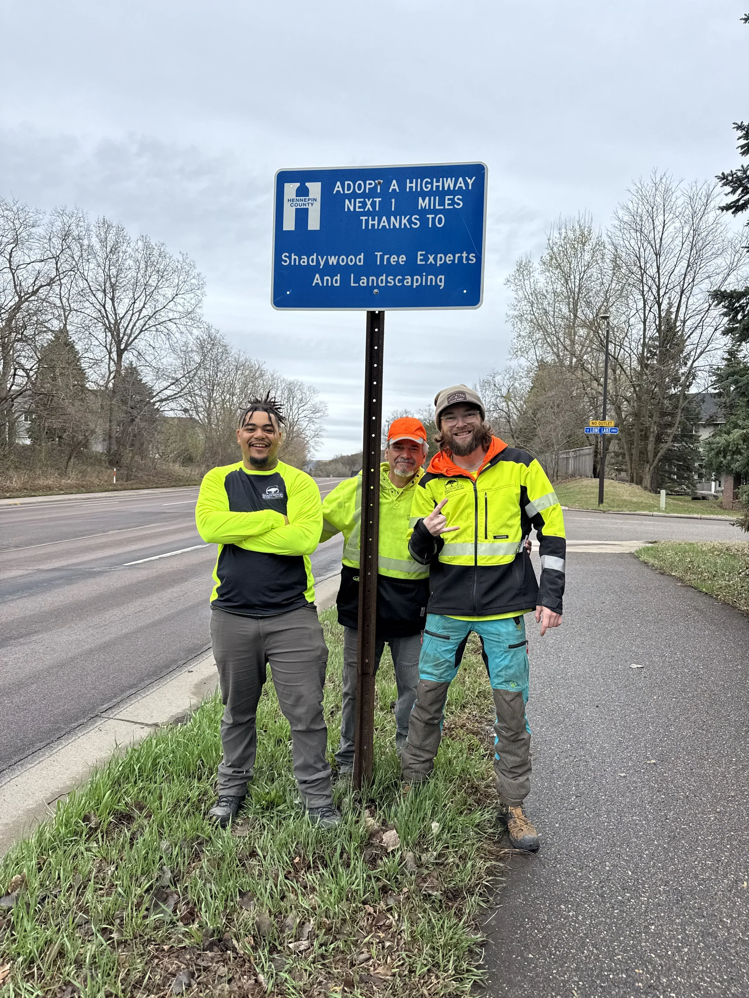 Three shadywood crew members are helping to clean up a strip of highway as part of the "Adopt a highway" program.