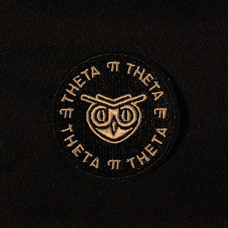 Theta Pi Theta owl badge.jpg