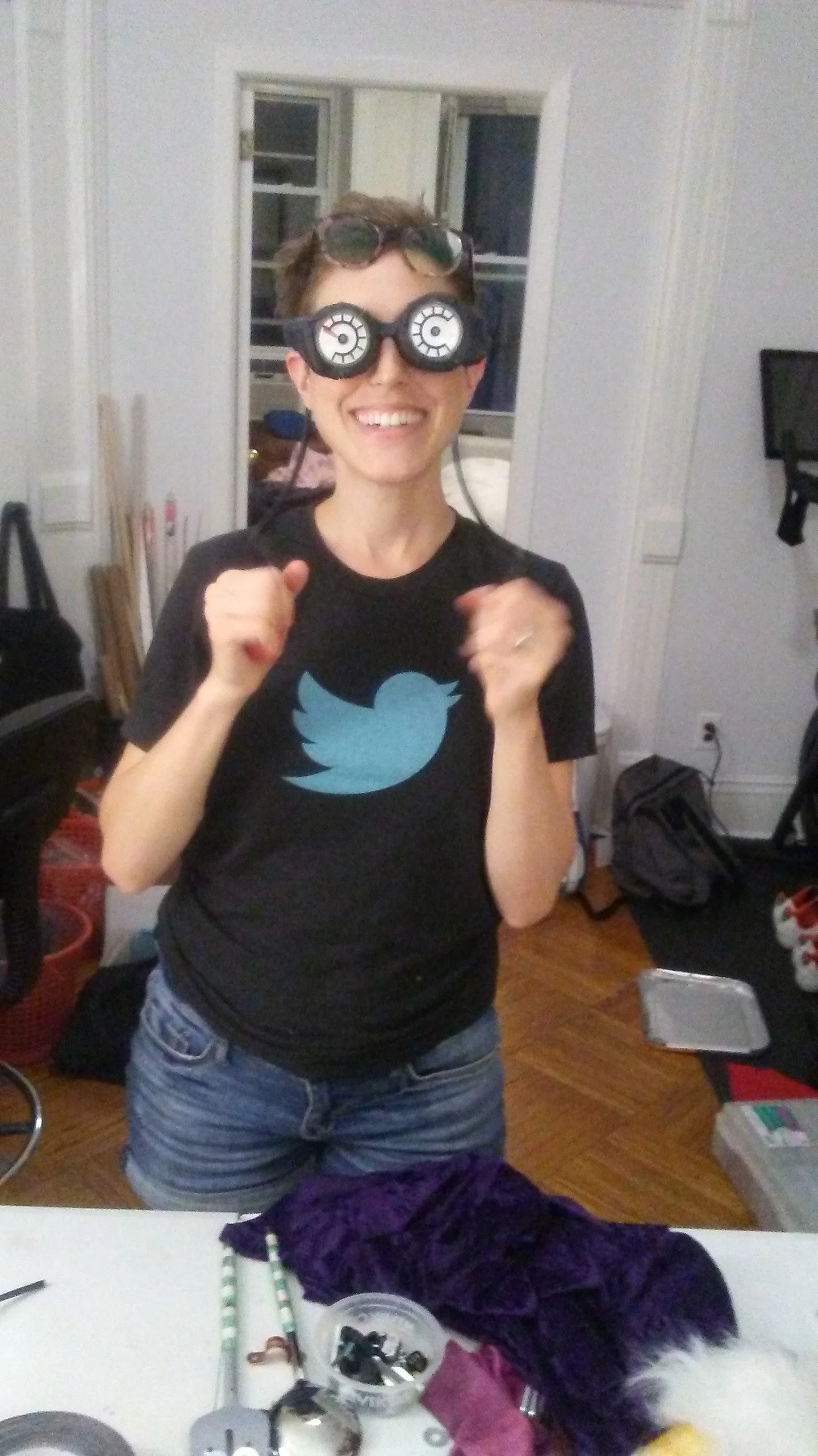 Ora demonstrating the Witch’s eyes. They’re made out of the blood pressure takers from those old fischer price doctor kits.
