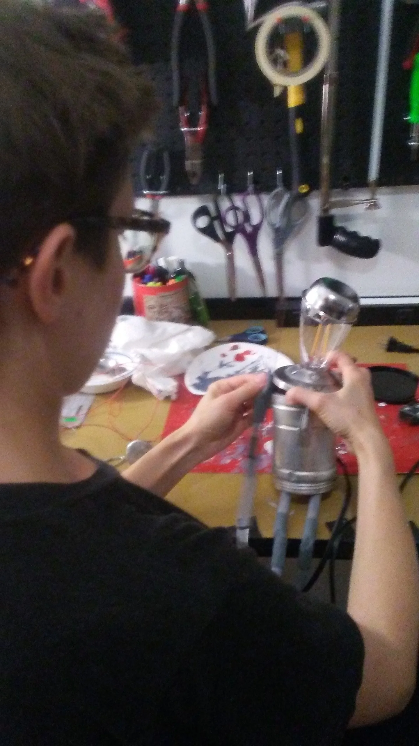 The artist at work, Ora building Pocket the Tailor in her workshop.