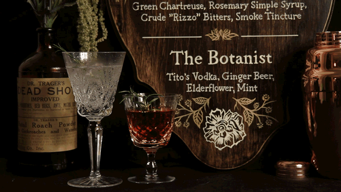 cinemagraph animated gif of custom bar sign and fizzing cocktail drink