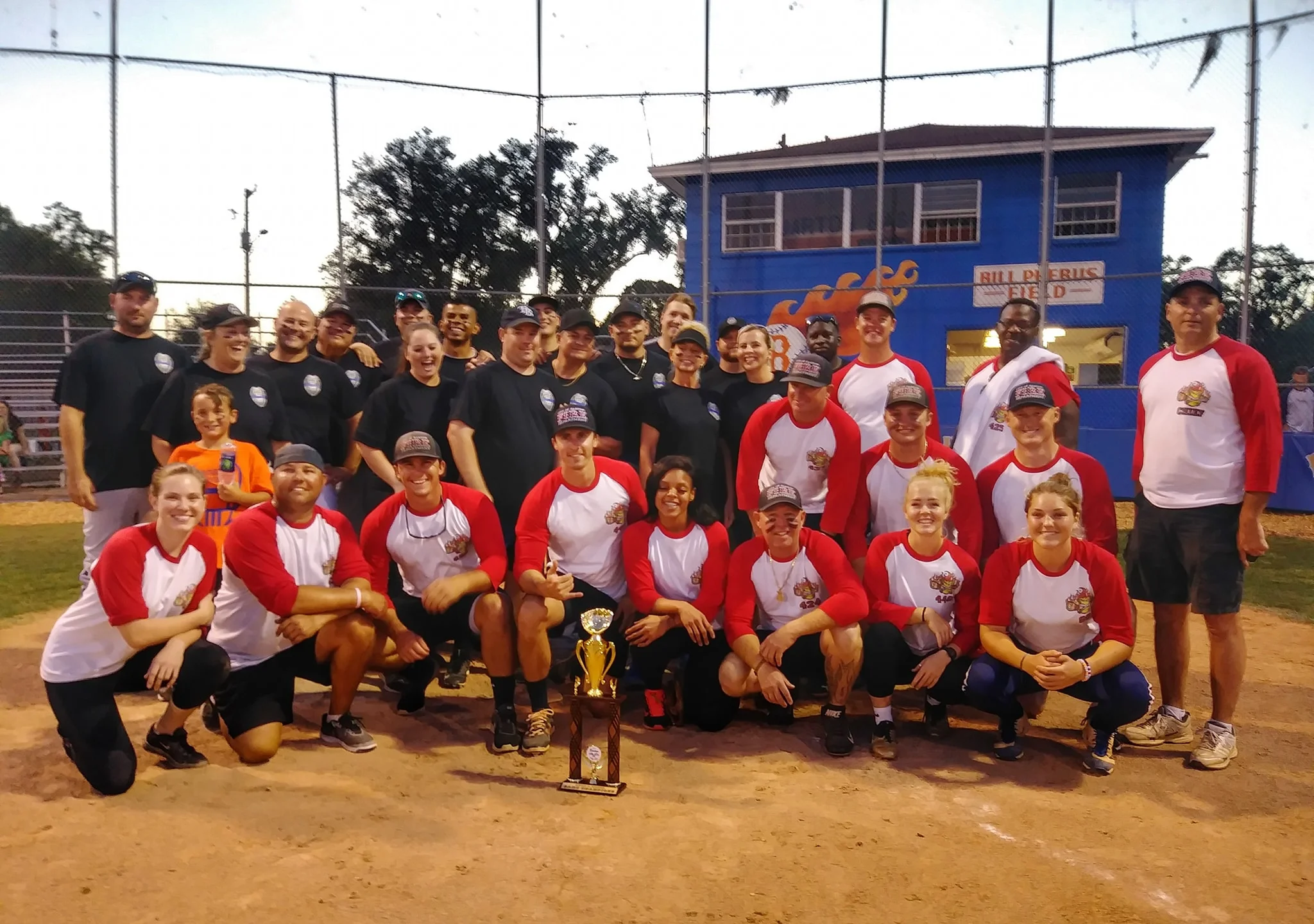 BARTOW - After the game, the winning Bartow Fire Deparment team, side by side, with the competing Bartow Police Department. Special thanks to Bartow High School for hosting this event. Monies and concessions are donated to the George W. Harris Youth Shelter, a shelter that provides temporary safe-haven to youths, ages 10-17, in need.