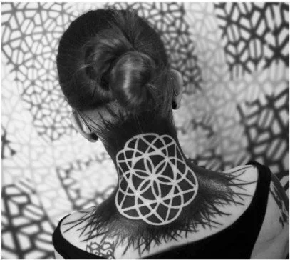 Heavy geometrical design tattoo